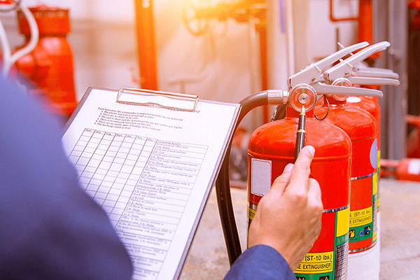 Engineer checking Industrial fire control system,Fire Alarm cont